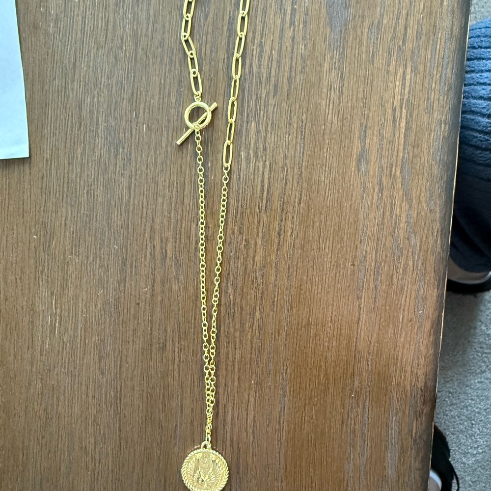 Uncommon James Brand New Gold Pendant Necklace with angle wing charm. 16” length